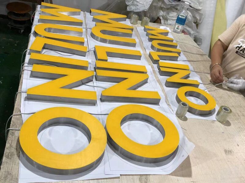 3D channel letters with gold faces and metal returns during fabrication at the ALFA Signage workshop